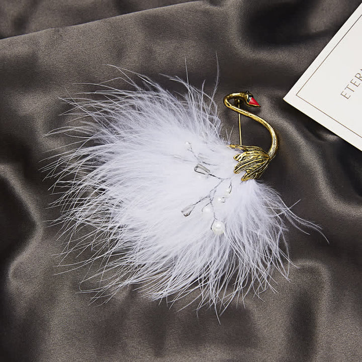 Broche de plumas de cisne de peluche blanco y negro para mujer
