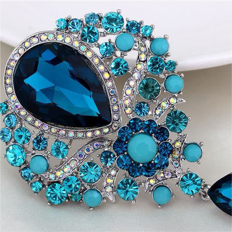 Broche de cristal transparente con forma de flor y gota de agua para mujer.