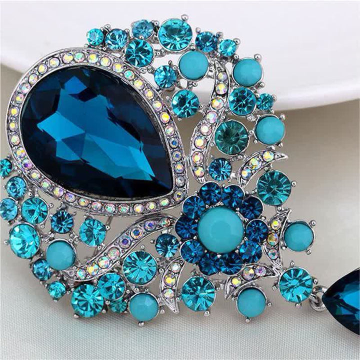 Broche de cristal transparente con forma de flor y gota de agua para mujer.