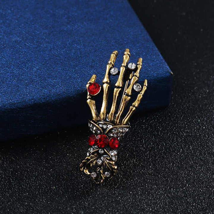 Broche de diamantes de imitación con forma de mano de esqueleto para hombre