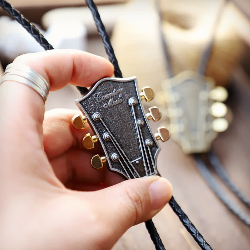 Corbata bolo con diseño de guitarra retro de música country del oeste