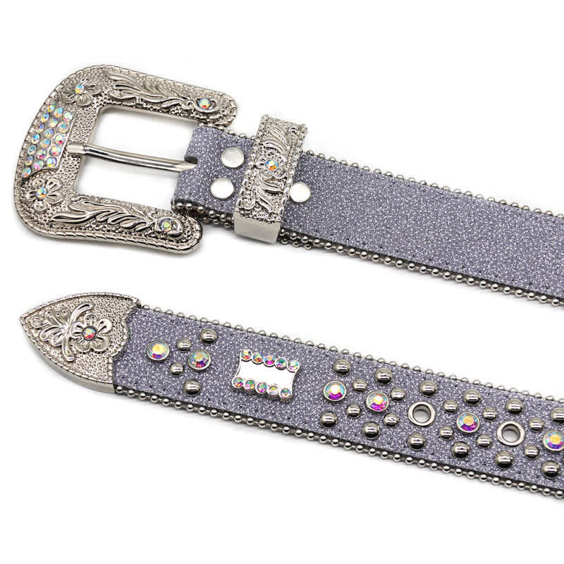 Cinturón de cuero con remaches de diamantes de imitación y hebilla tallada con flores