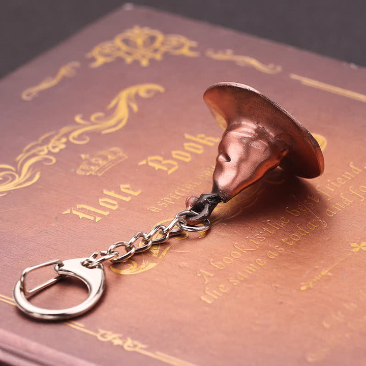 Llavero con colgante de sombrero de bruja mágico - image 2