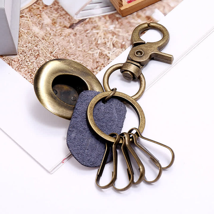 Llavero de cuero con sombrero de vaquero de bronce antiguo retro