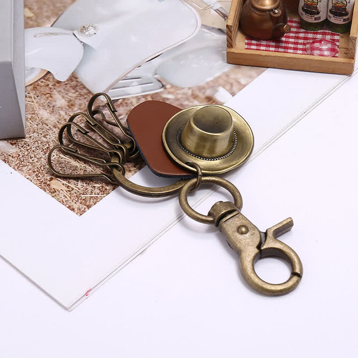 Llavero de cuero con sombrero de vaquero de bronce antiguo retro