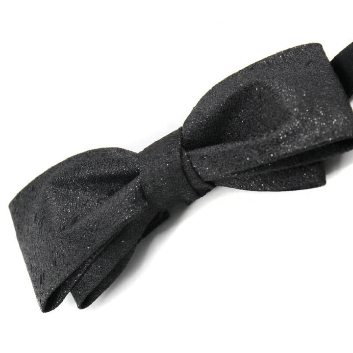 Pajarita elegante negra con brillo sutil para hombre