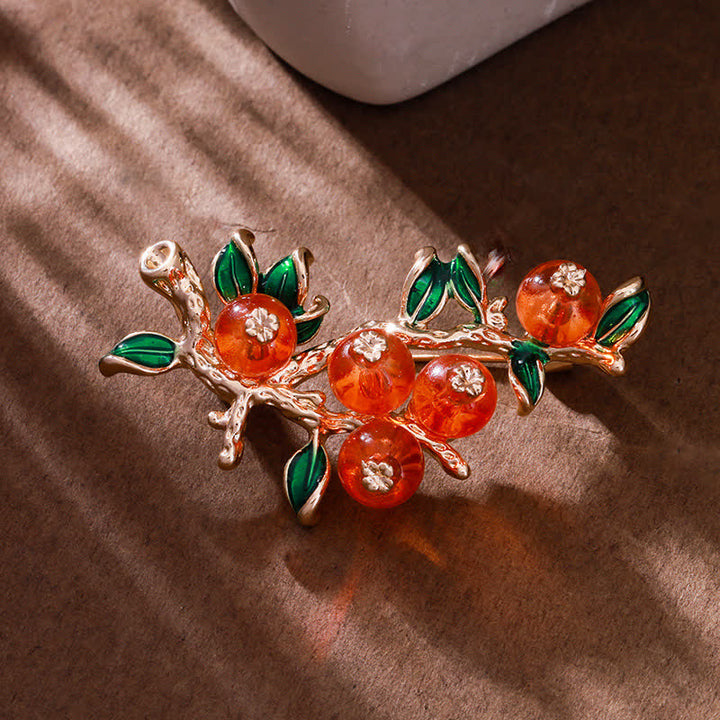Broche de la suerte con forma de árbol de caqui para mujer