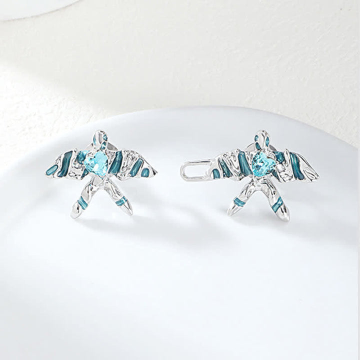 Clip para cinturón con forma de cometa de cristal azul para mujer