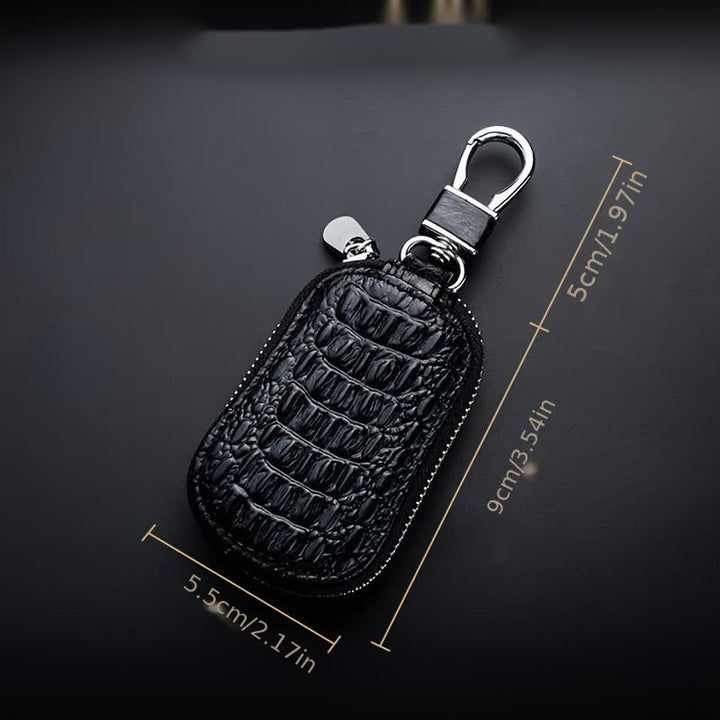 Estuche para llaves de coche de cuero con cremallera y diseño de cocodrilo.