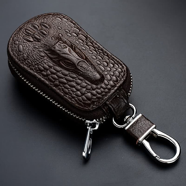 Estuche para llaves de coche de cuero con cremallera y diseño de cocodrilo.