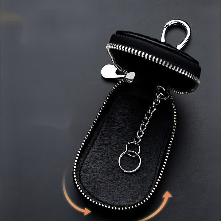Estuche para llaves de coche de cuero con cremallera y diseño de cocodrilo.
