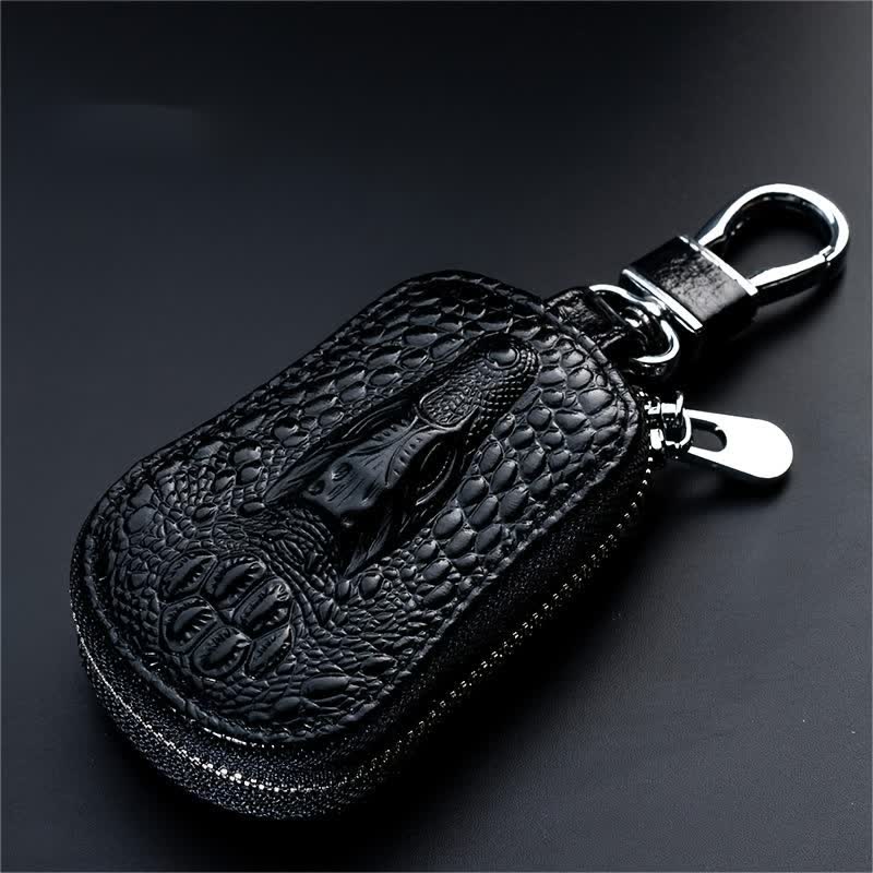 Estuche para llaves de coche de cuero con cremallera y diseño de cocodrilo.