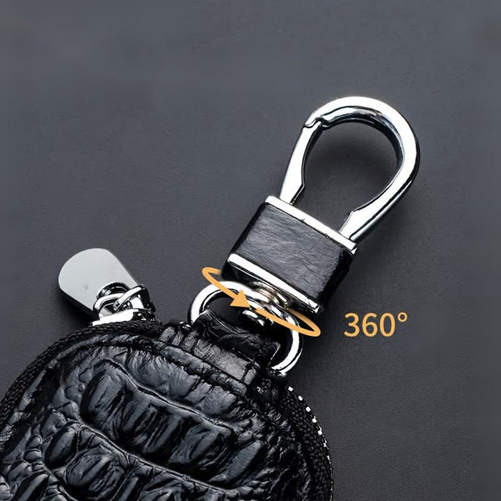 Estuche para llaves de coche de cuero con cremallera y diseño de cocodrilo.
