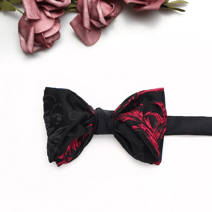 Pajarita para hombre con estampado floral de enredaderas negras y rojas
