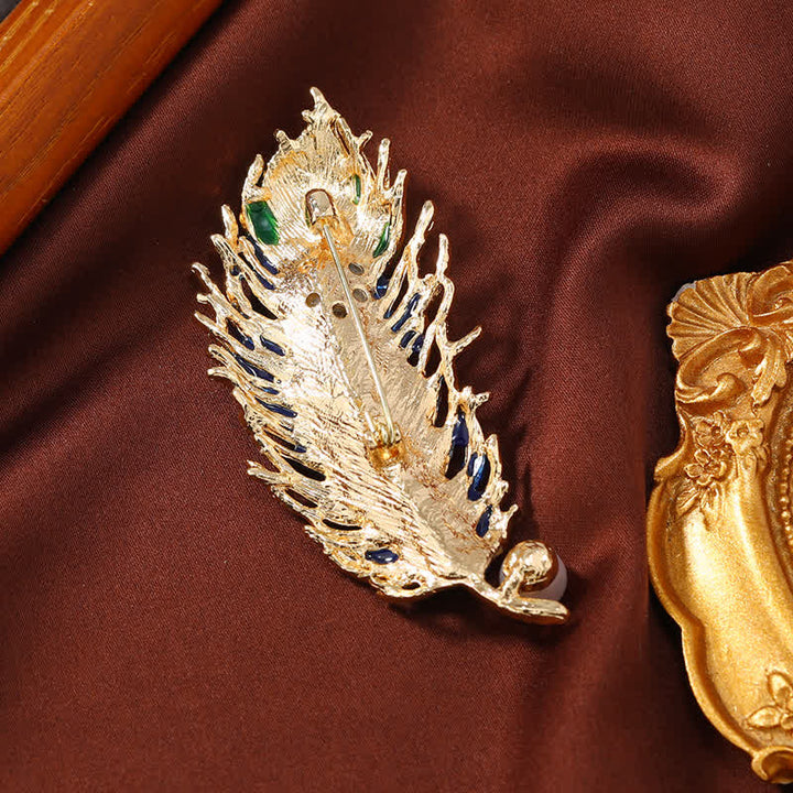 Broche de cristal con pluma de fénix esmaltada para mujer