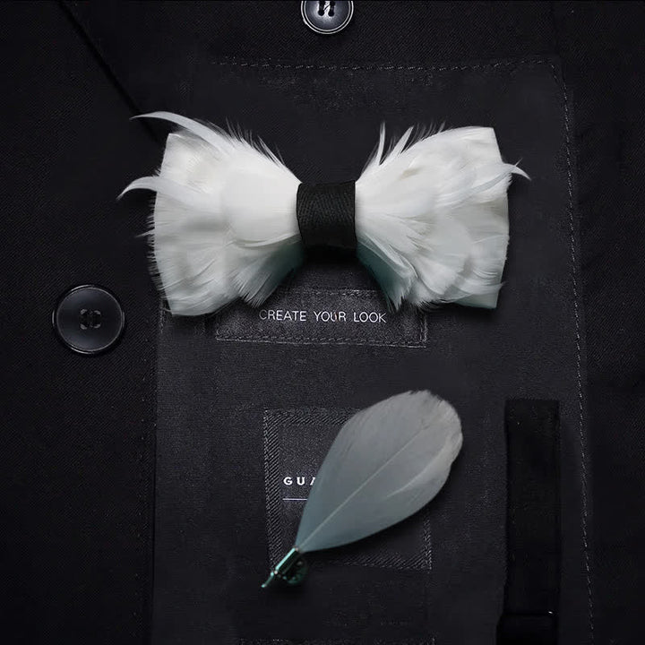 Pajarita elegante de plumas blancas y negras para niños con prendedor de solapa