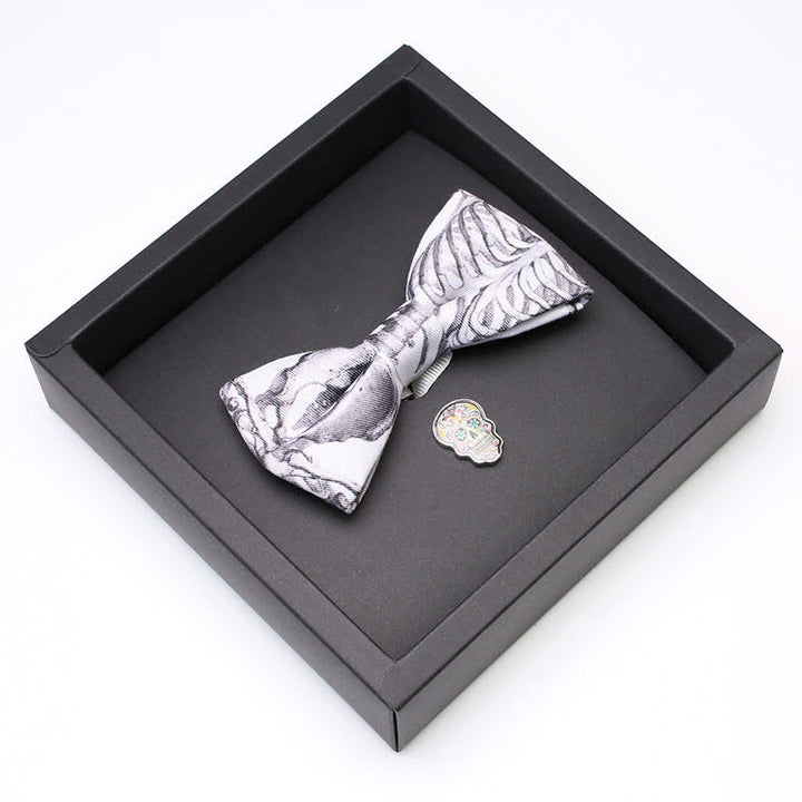 Juego de 2 broches y pajaritas con forma de calavera y esqueleto gris para hombre