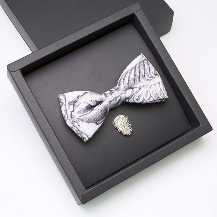 Juego de 2 broches y pajaritas con forma de calavera y esqueleto gris para hombre