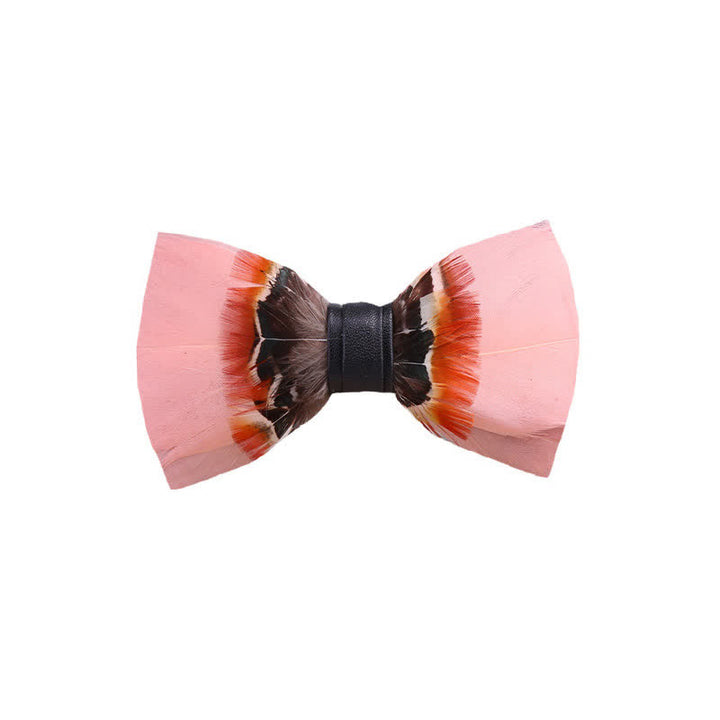 Pajarita con plumas rosas pop y broche de solapa