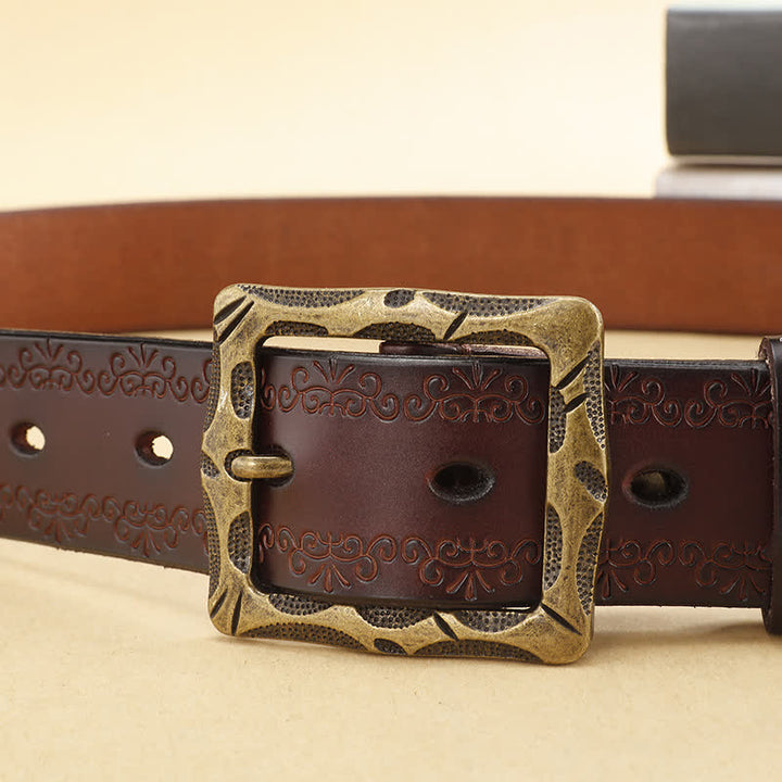 Cinturón de piel con hebilla rectangular y correa floral