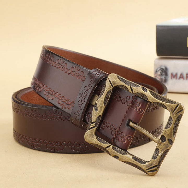 Cinturón de piel con hebilla rectangular y correa floral