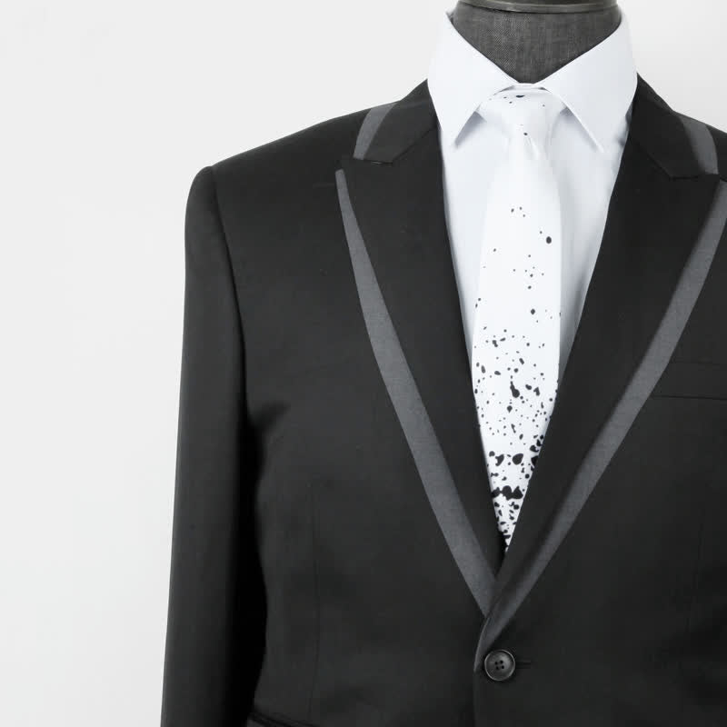 Corbata de hombre con salpicaduras de tinta abstracta en blanco y negro