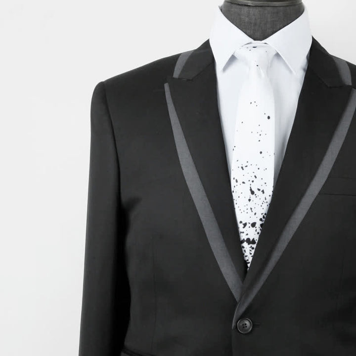 Corbata de hombre con salpicaduras de tinta abstracta en blanco y negro