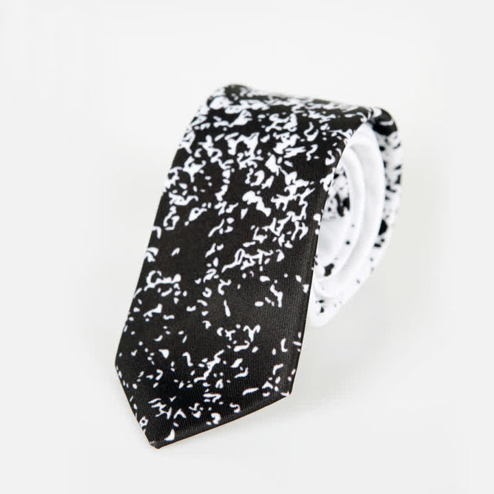 Corbata de hombre con salpicaduras de tinta abstracta en blanco y negro