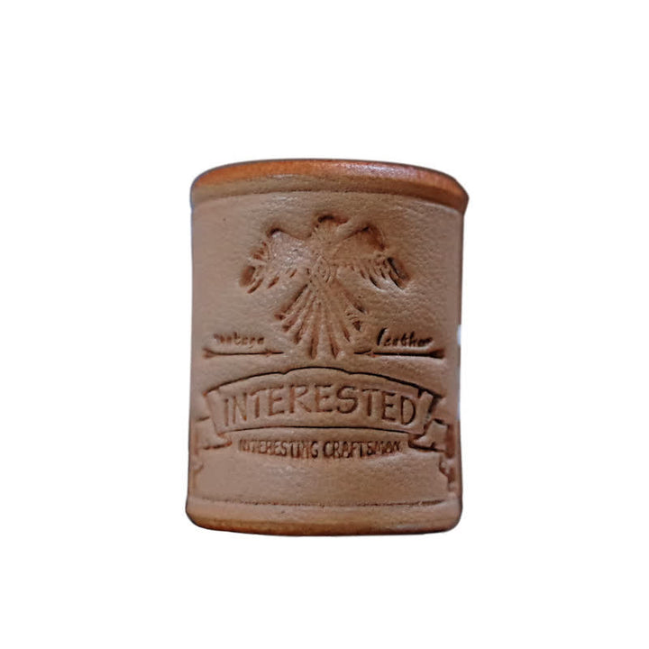 Anillo de piel curtida vegetal con águila en relieve