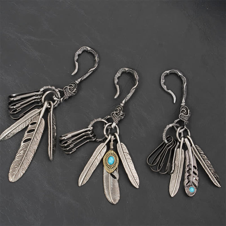 Llavero de cuero turquesa azul con plumas de calavera estilo boho