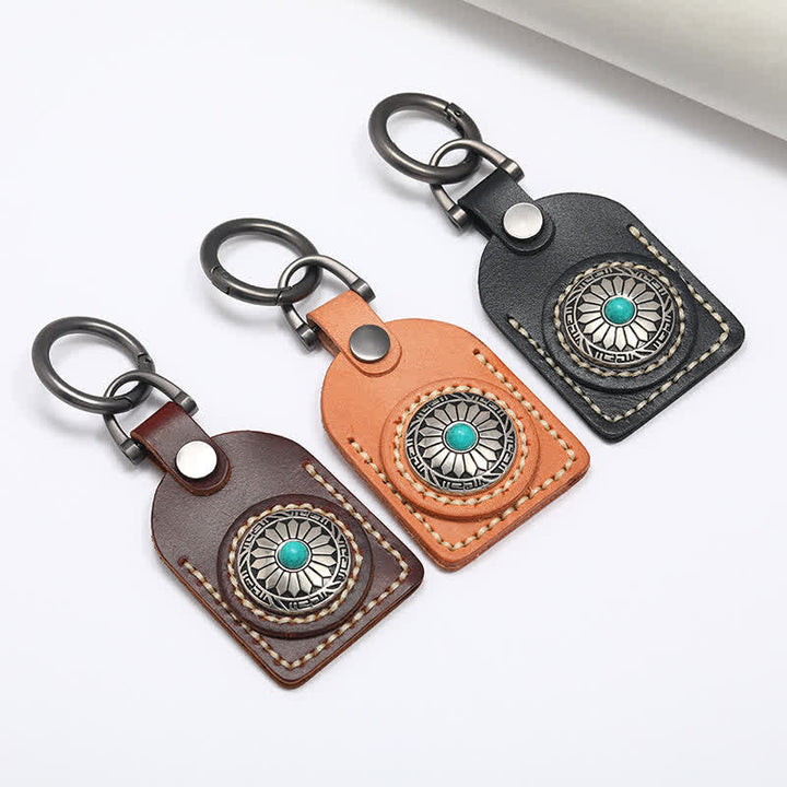 Encantador llavero de cuero turquesa con flor bohemia