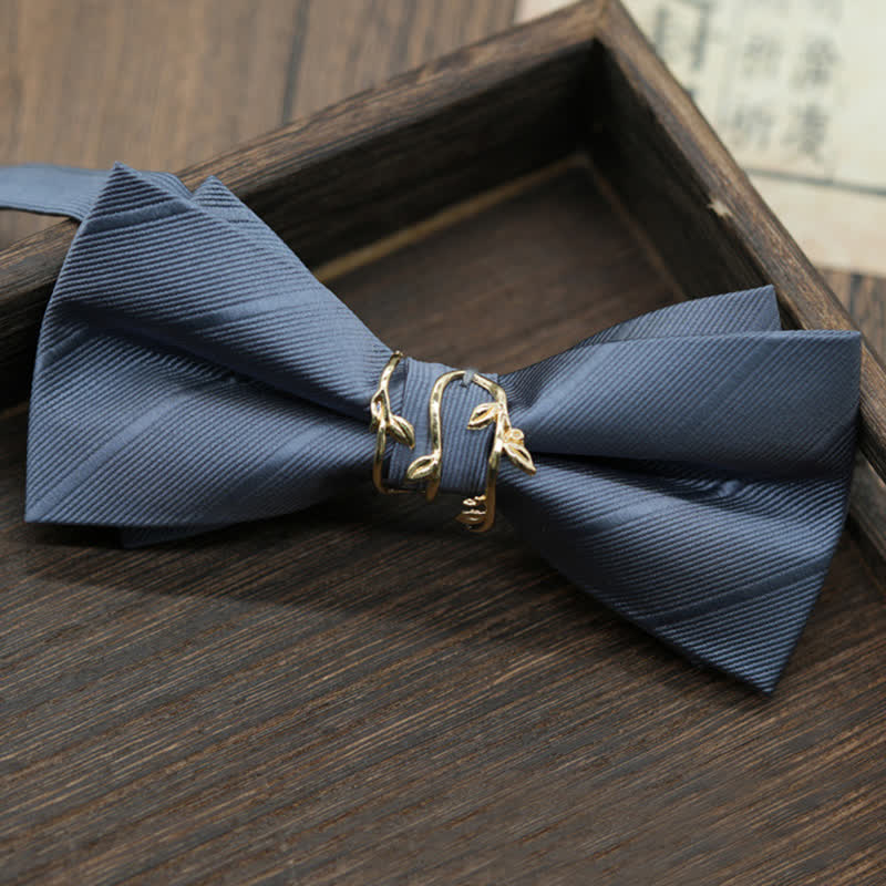 Pajarita de sarga con forma de rama de metal dorado para hombre