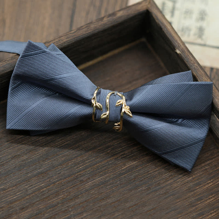 Pajarita de sarga con forma de rama de metal dorado para hombre