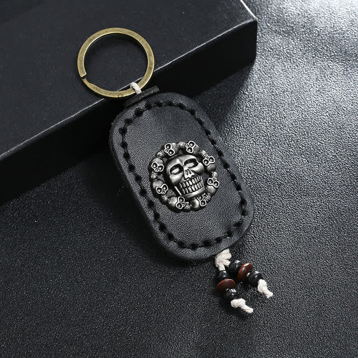 Llavero de cuero con colgante de calavera ovalada de estilo gótico
