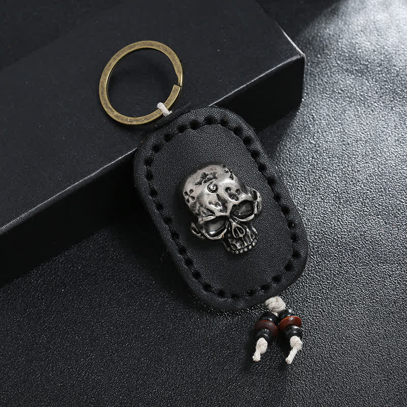 Llavero de cuero con colgante de calavera punk en 3D