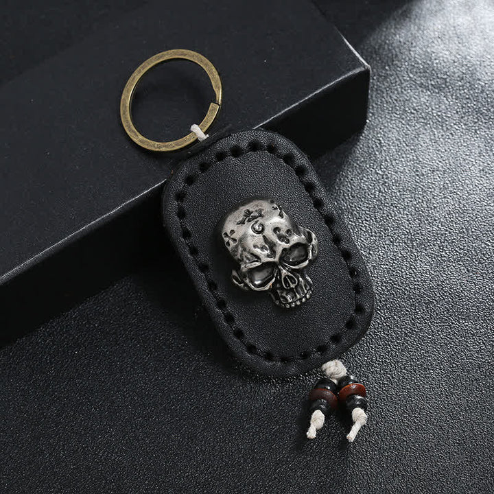 Llavero de cuero con colgante de calavera punk en 3D