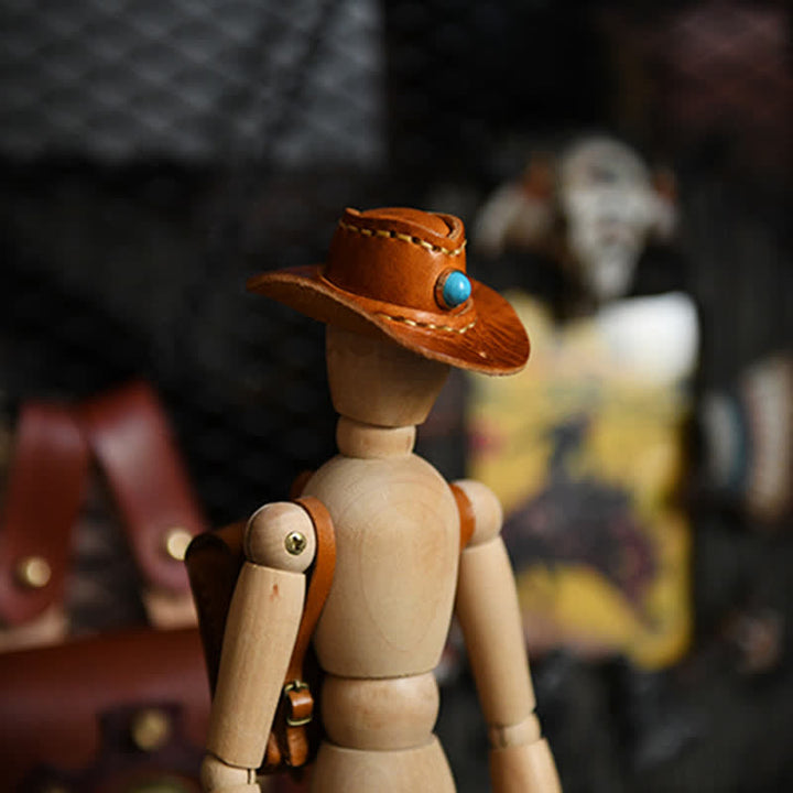 Llavero hecho a mano con sombrero de vaquero de cuero