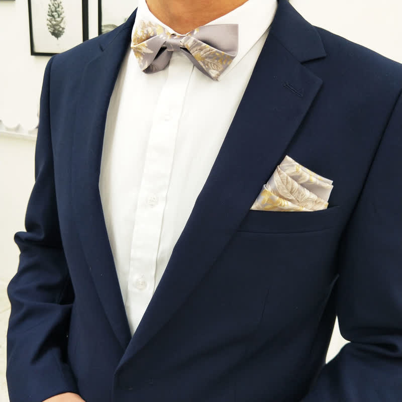Pajarita elegante con estampado floral en gris, amarillo y blanco para hombre