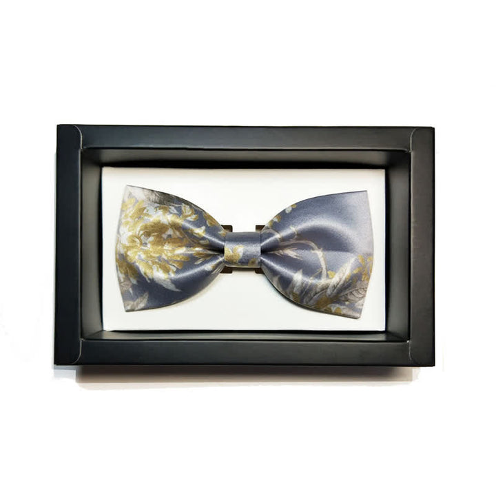 Pajarita elegante con estampado floral en gris, amarillo y blanco para hombre