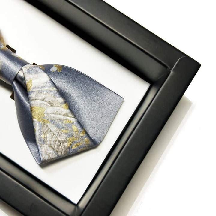 Pajarita elegante con estampado floral en gris, amarillo y blanco para hombre