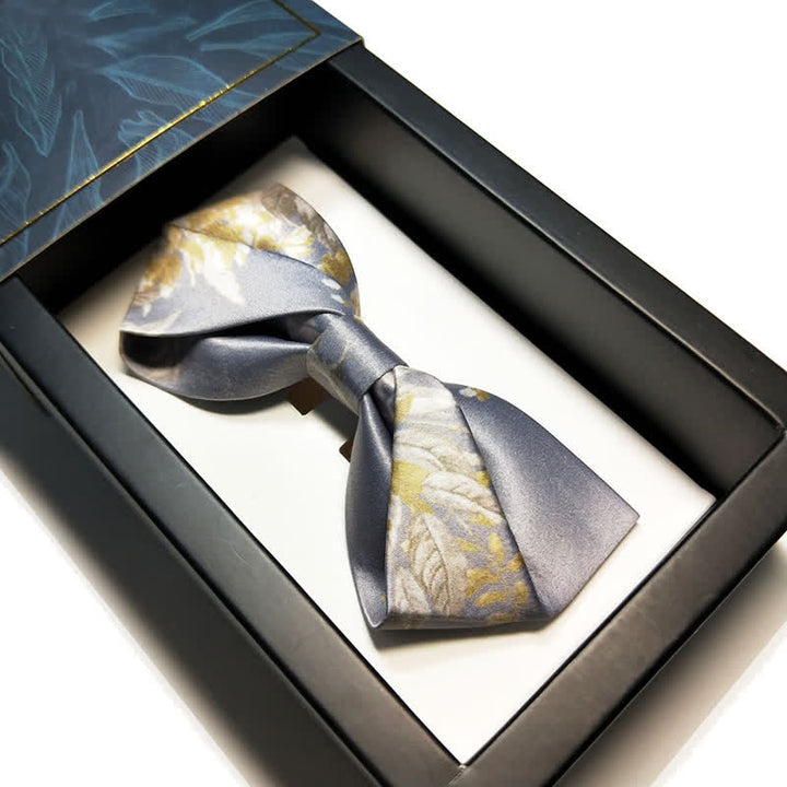 Pajarita elegante con estampado floral en gris, amarillo y blanco para hombre