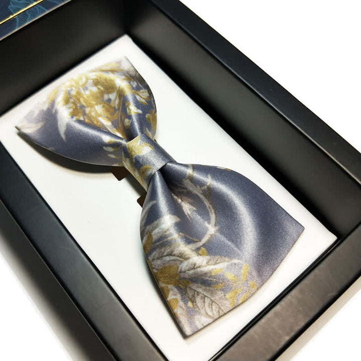 Pajarita elegante con estampado floral en gris, amarillo y blanco para hombre