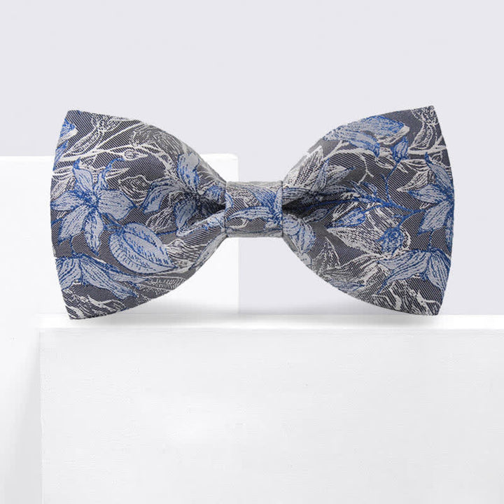 Pajarita de seda con estampado de flores y hojas en gris y azul para hombre