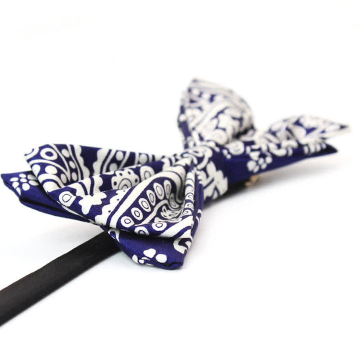 Pajarita para hombre con estampado de lunares en azul marino y blanco de anacardo