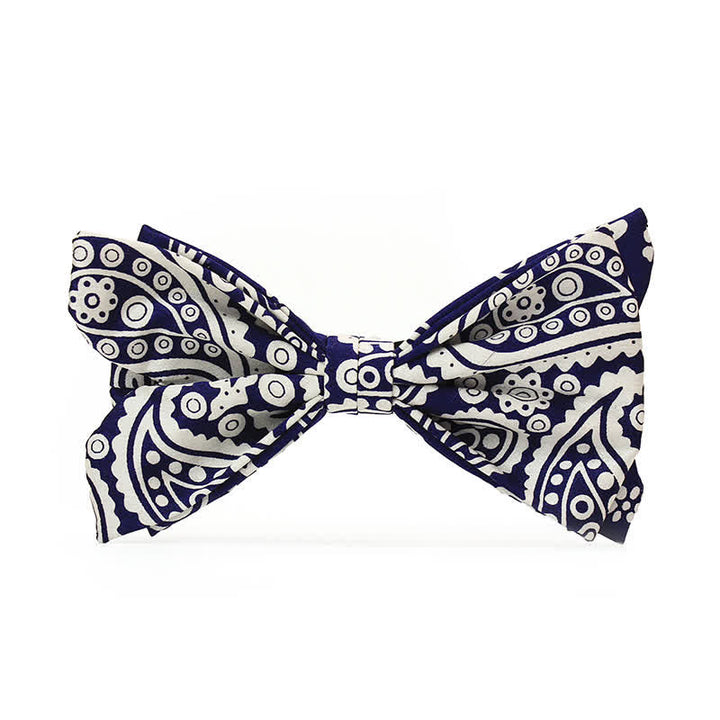 Pajarita para hombre con estampado de lunares en azul marino y blanco de anacardo