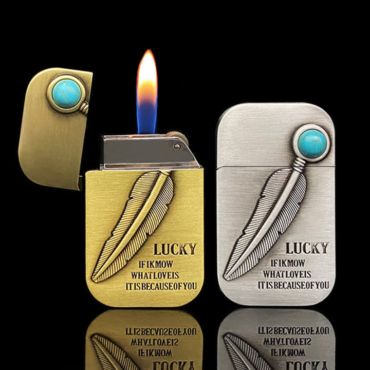Encendedor de butano recargable con efecto turquesa y diseño de plumas