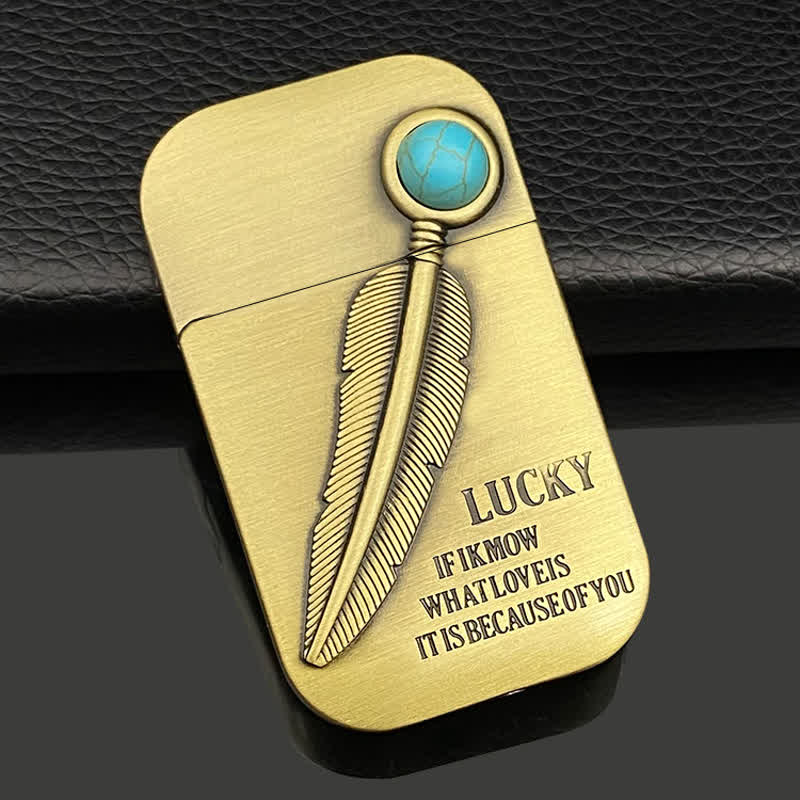 Encendedor de butano recargable con efecto turquesa y diseño de plumas