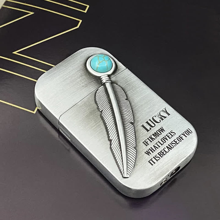 Encendedor de butano recargable con efecto turquesa y diseño de plumas