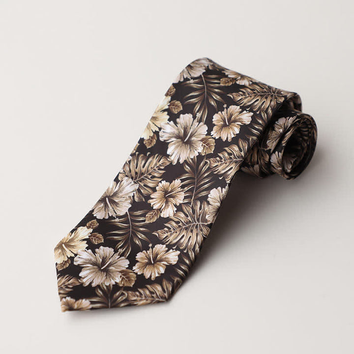 Corbata de hombre con delicado estampado floral en negro y tostado