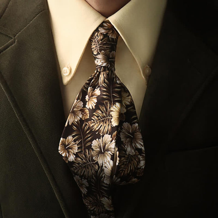 Corbata de hombre con delicado estampado floral en negro y tostado